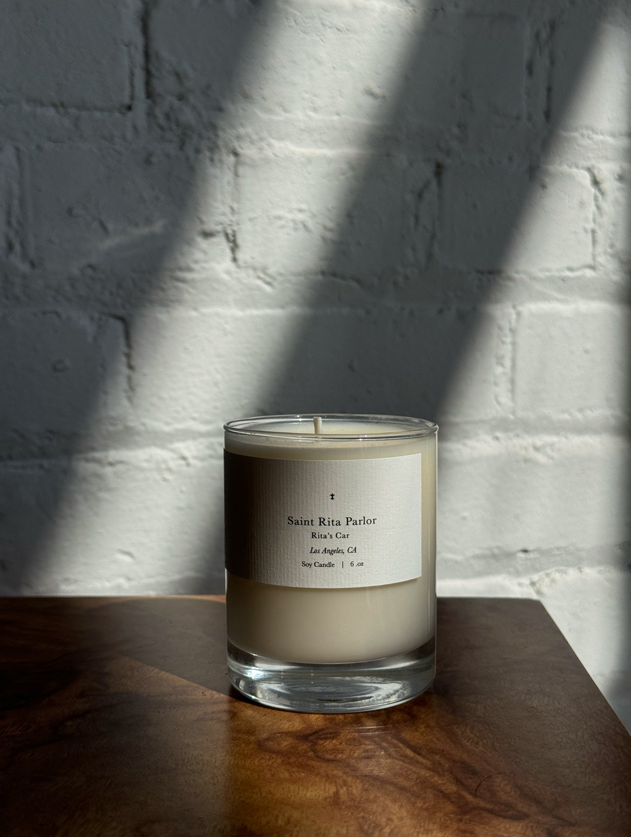 The Rita's Car Candle by Saint Rita Parlor