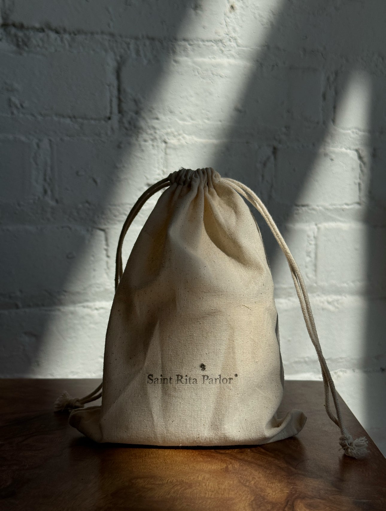 The Signature Candle by Saint Rita Parlor