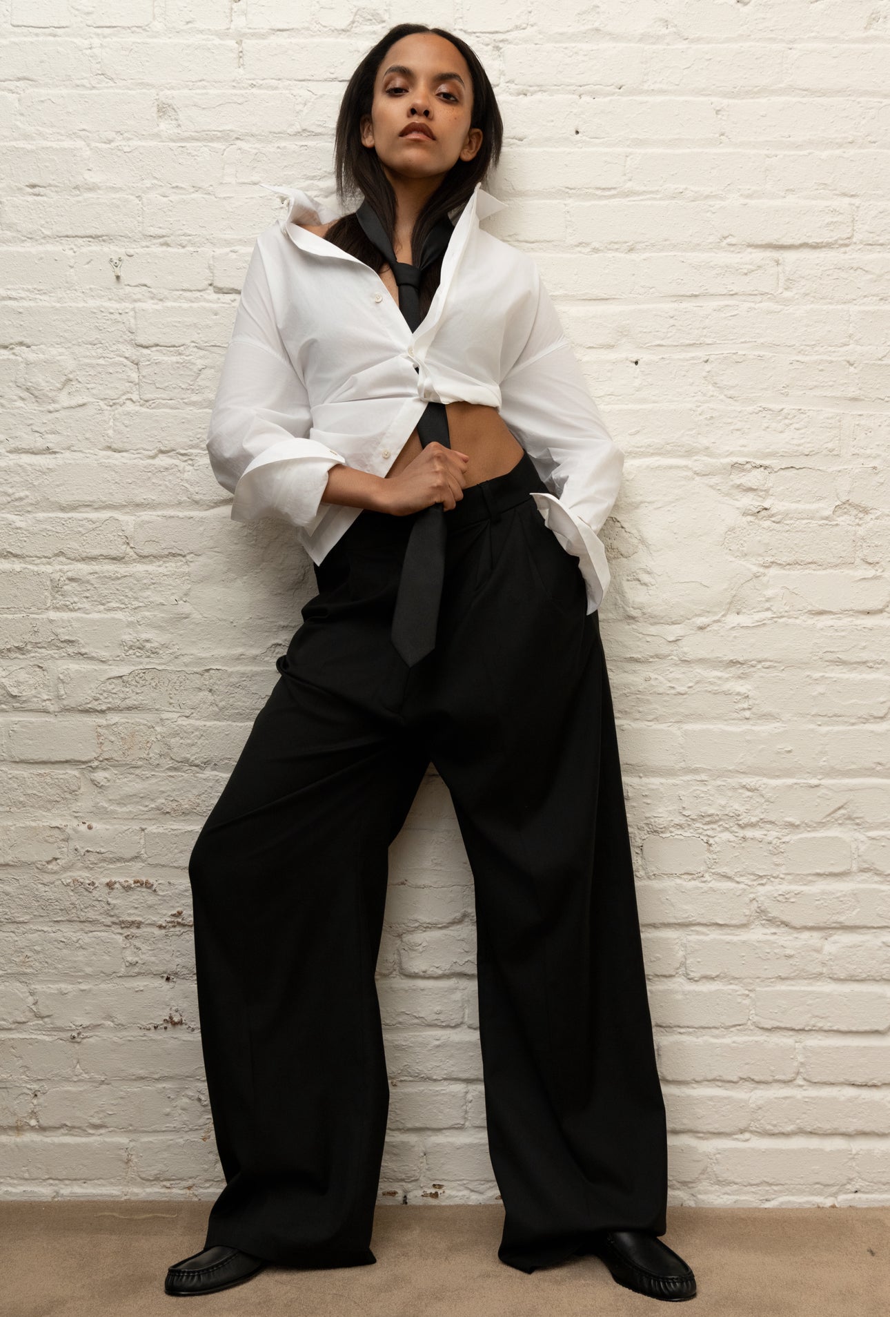 The Pleated Pant in Black by Studio Cut