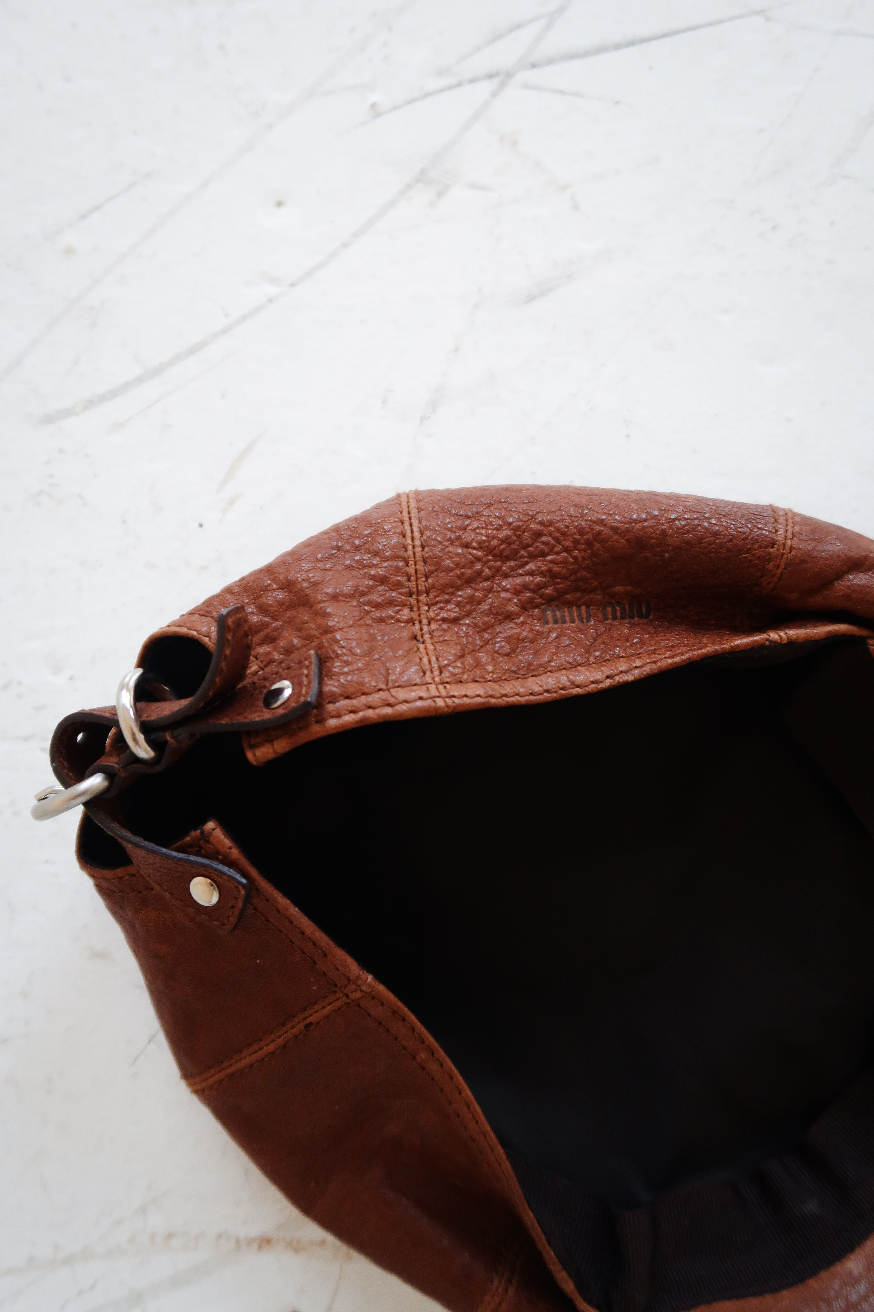 The Leather Cap by Miu Miu