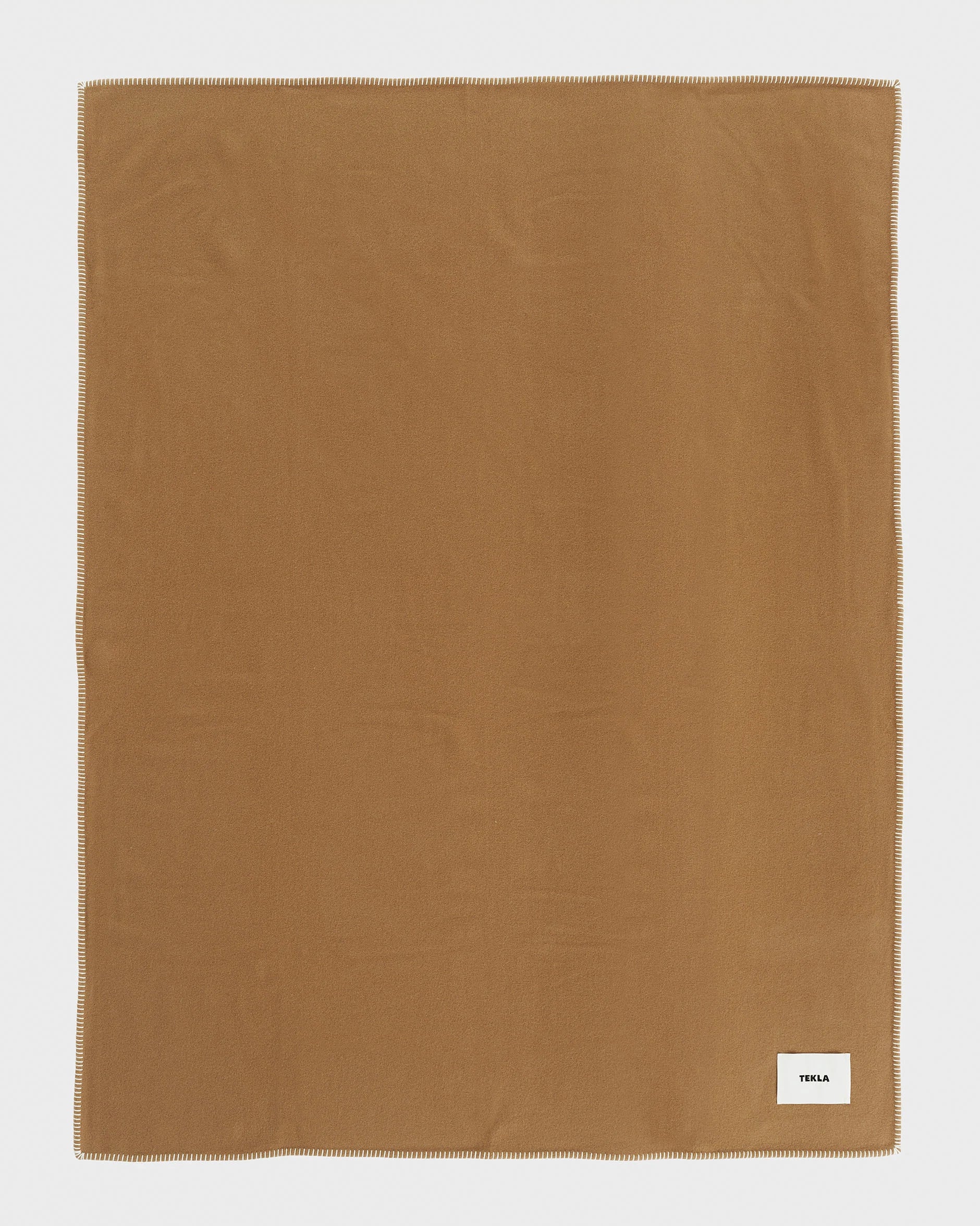 The Lambswool Blanket in Oak by Tekla