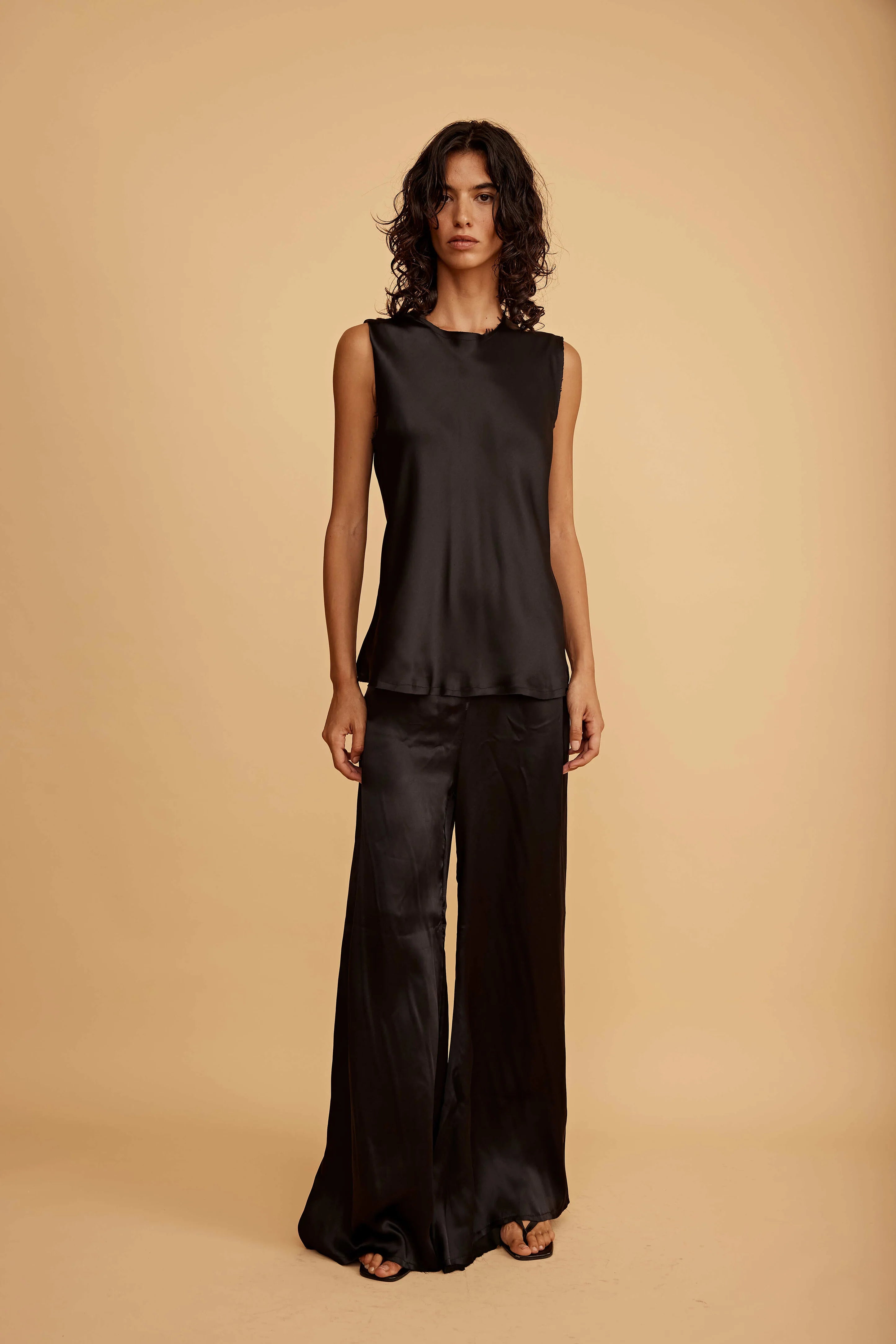 The Carine Raw Hem Silk Tank in Black by All Three