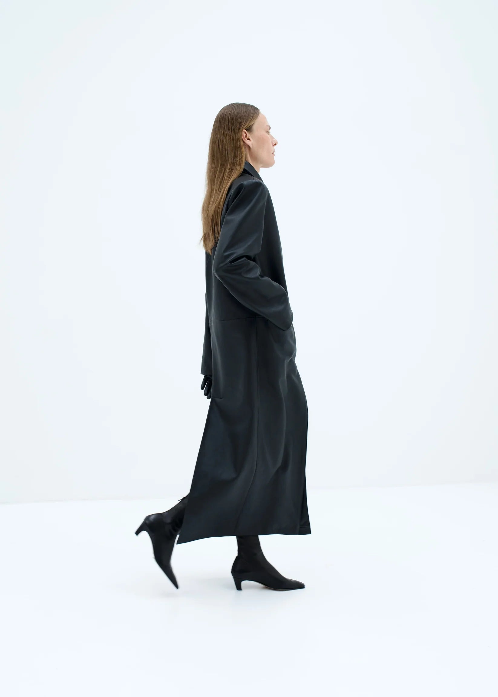 The Minimalist Leather Coat by Diana Milkanova