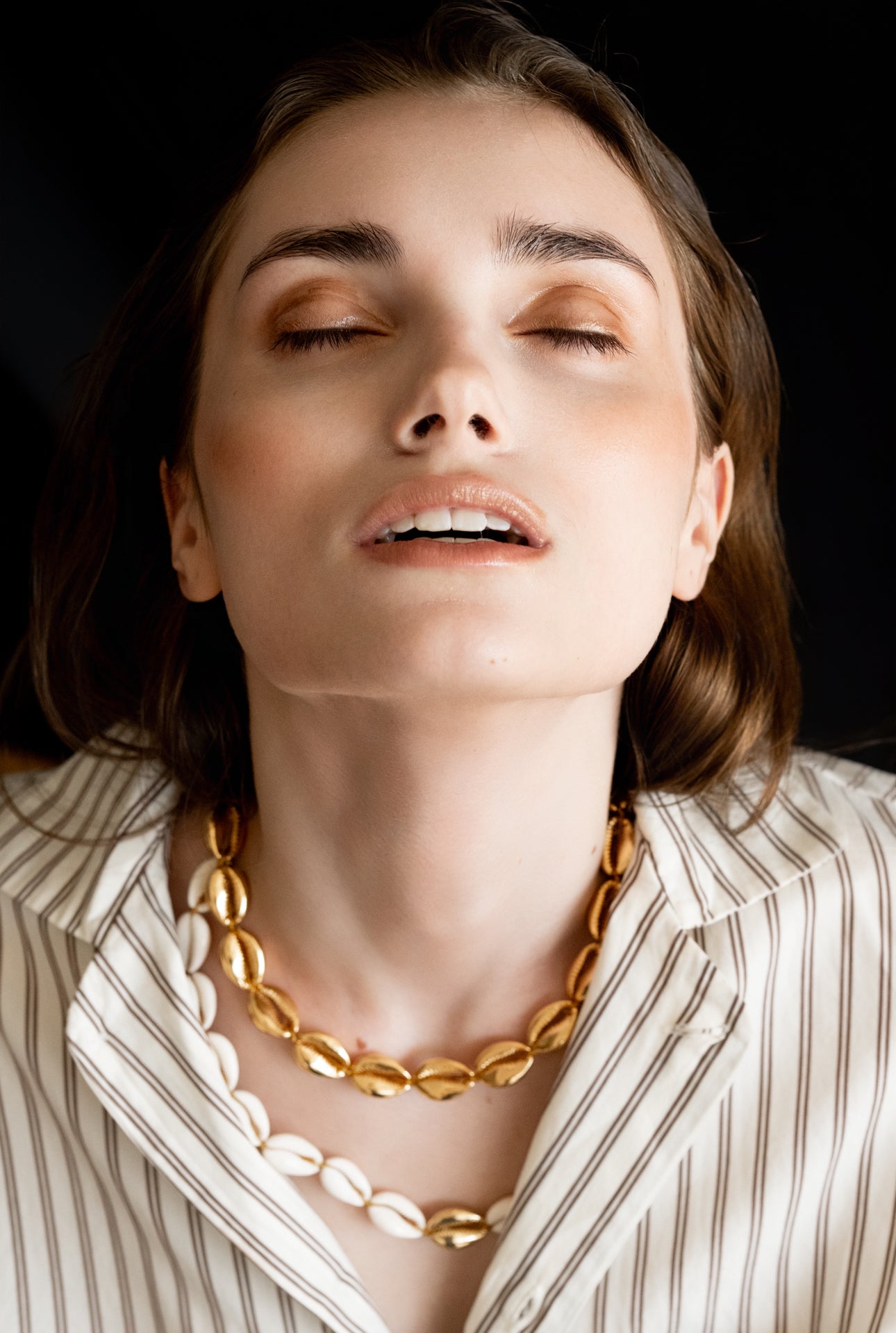 The Large Puka Shell Necklace in Gold by Tohum