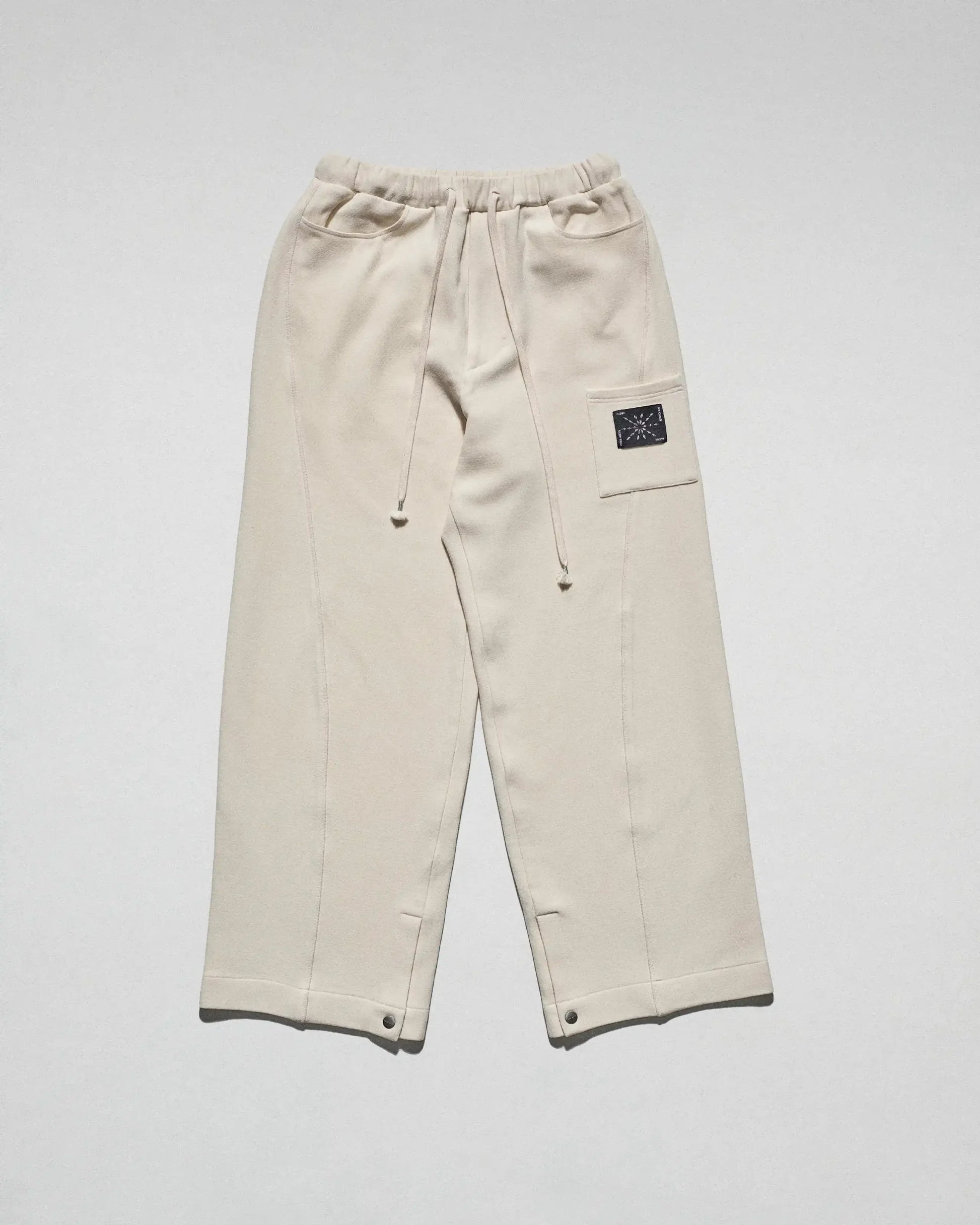 The Crepe Snap Pant in Cream by FREE ACTS