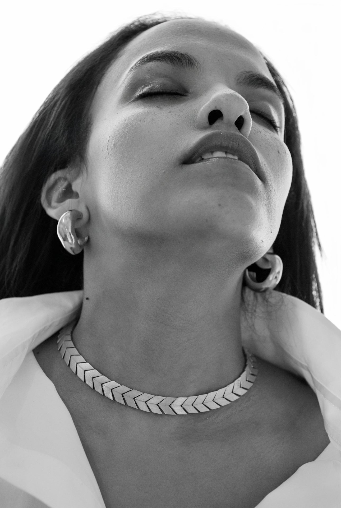 Medium Celia thick hoop earrings in gold vermeil by AGMES from Blackbird Collection's sustainable accessories collection