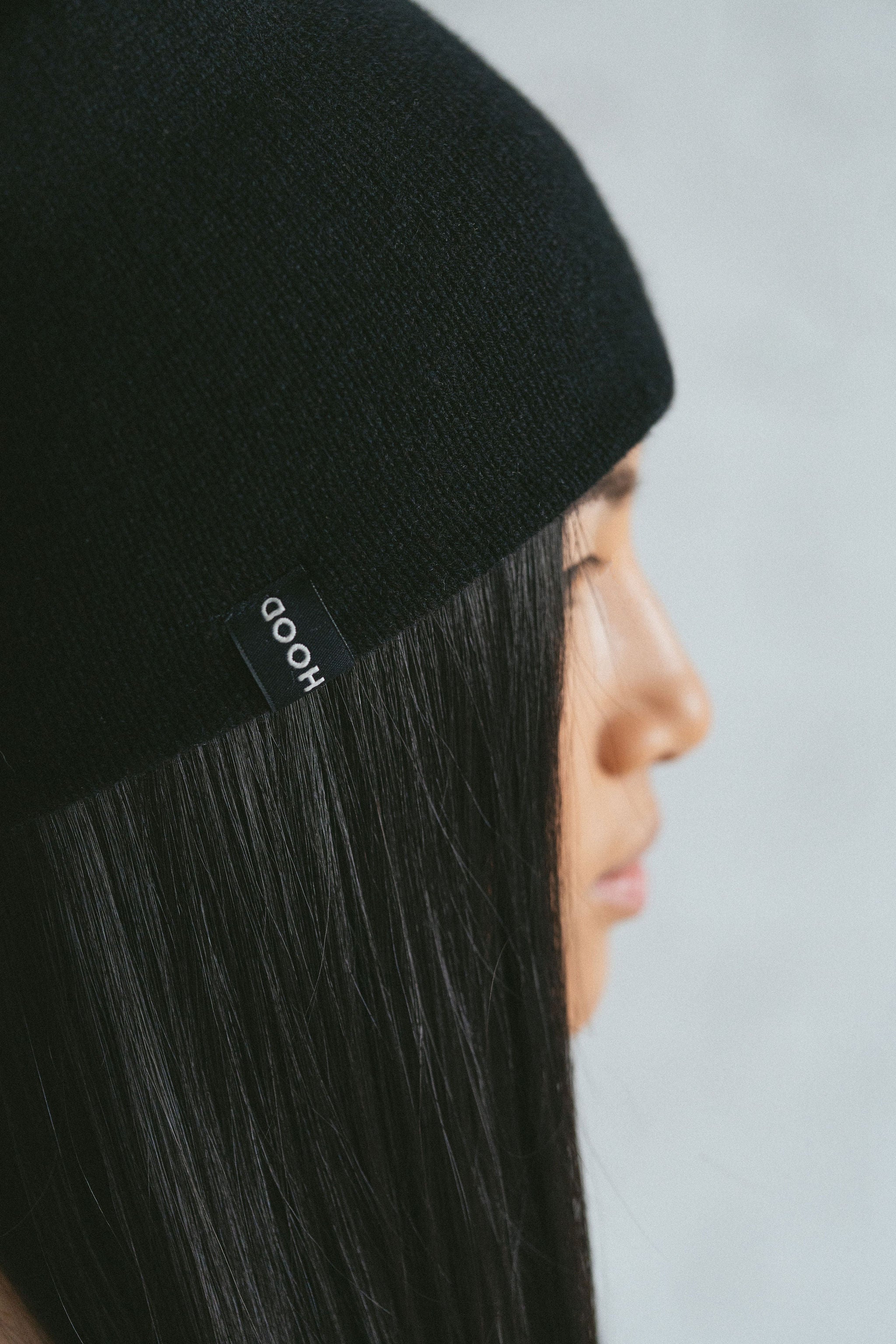 Black cashmere beanie winter essential by Amina Hood from Blackbird Collection's sustainable accessories close up