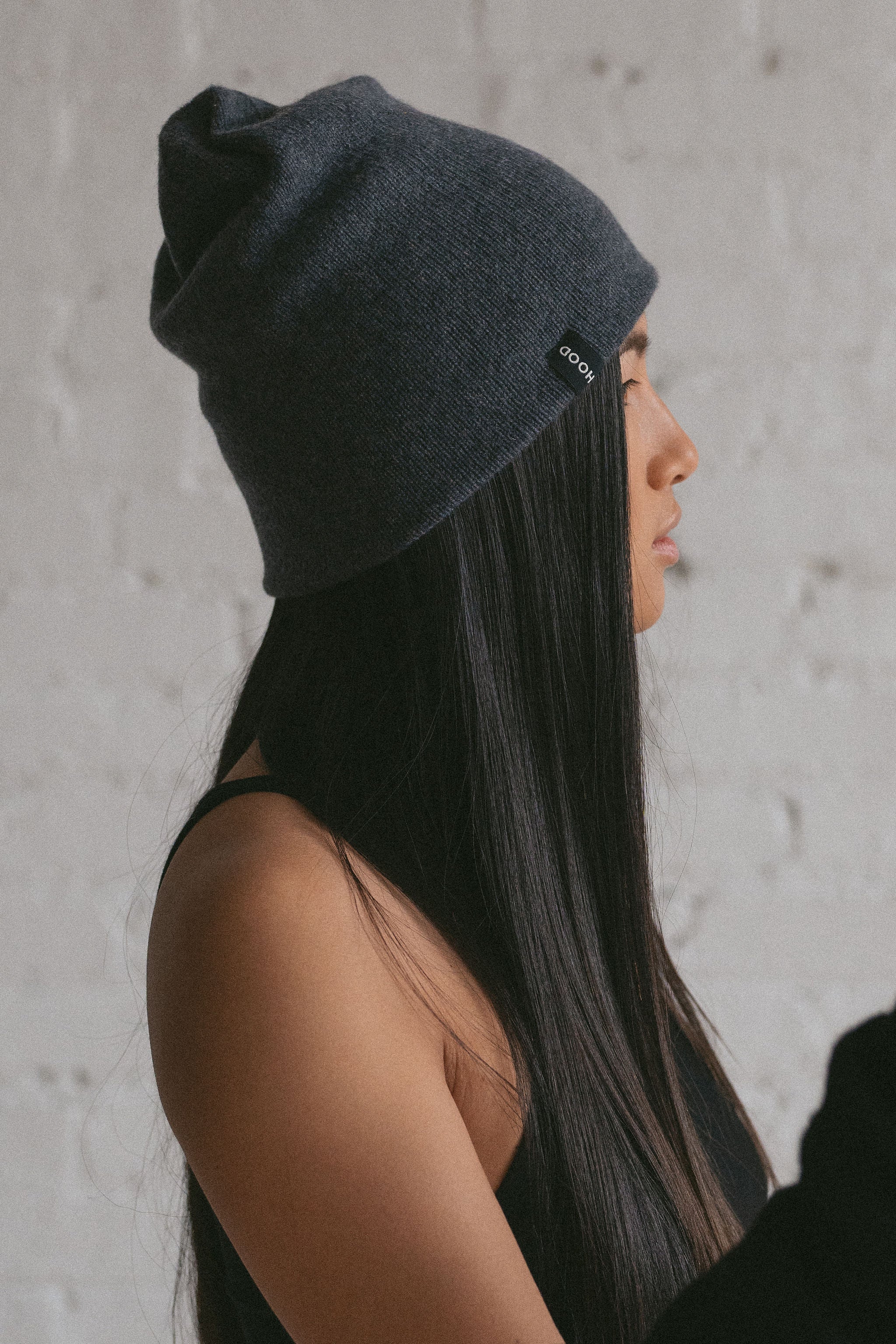 Charcoal grey cashmere beanie winter essential by Amina Hood from Blackbird Collection's sustainable accessories