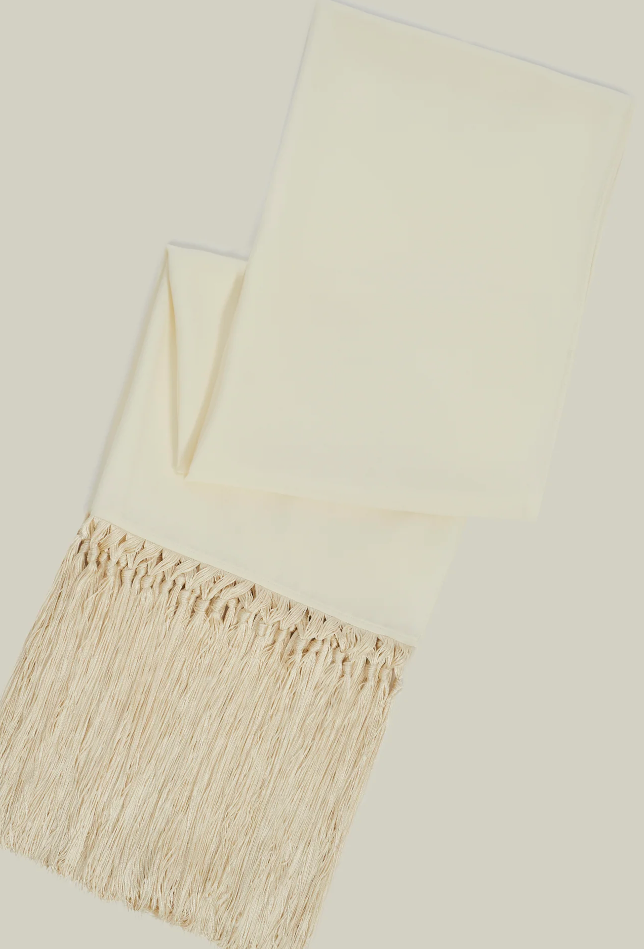 Latte Babe stole in beige with fringe by Taller Marmo from Blackbird Collection's sustainable accessories
