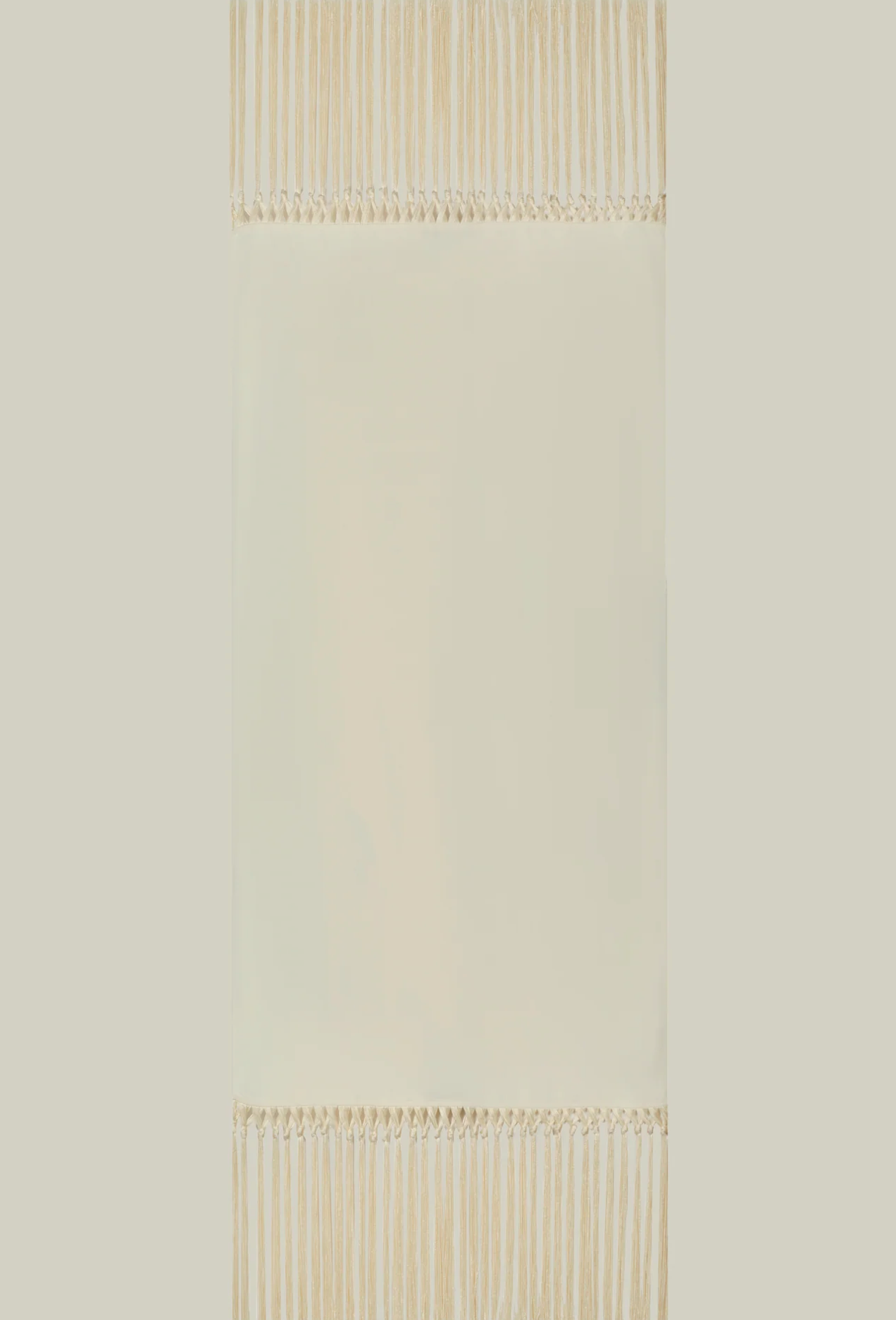 Latte Babe stole in beige with fringe by Taller Marmo from Blackbird Collection's sustainable accessories