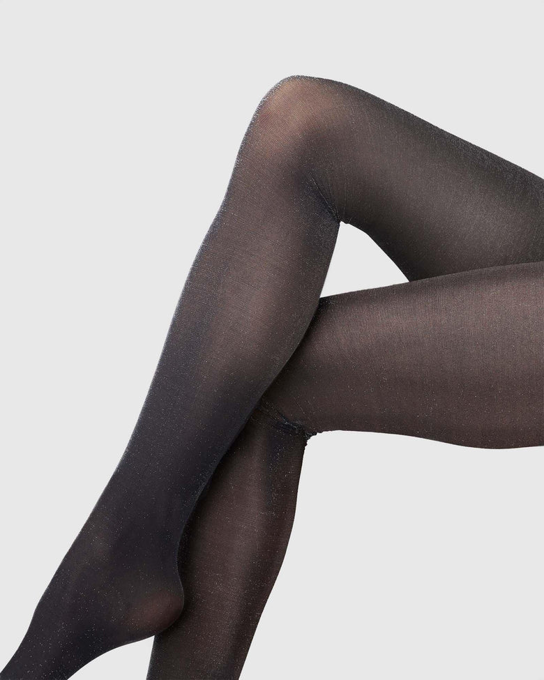 Black shimmery semi-sheer Cornelia tights by Swedish Stockings from Blackbird Collection's sustainable accessories