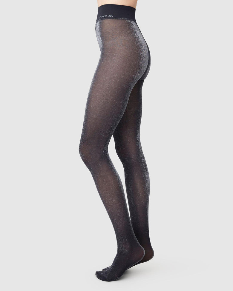 Black shimmery semi-sheer Cornelia tights by Swedish Stockings from Blackbird Collection's sustainable accessories