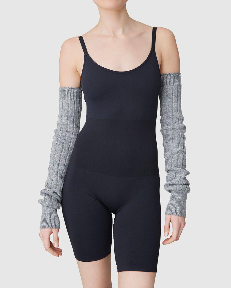 Grey leg and arm warmers by Swedish Stockings made from merino wool and cashmere from Blackbird Collection's sustainable accessories