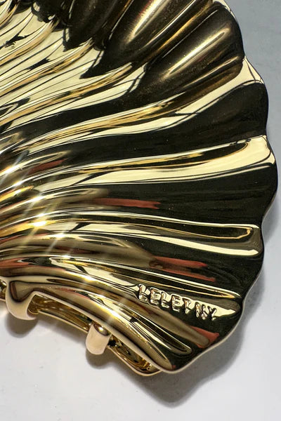 Large glossy shell hair clip in gold beach accessory by Lelet from Blackbird Collection's sustainable accessories