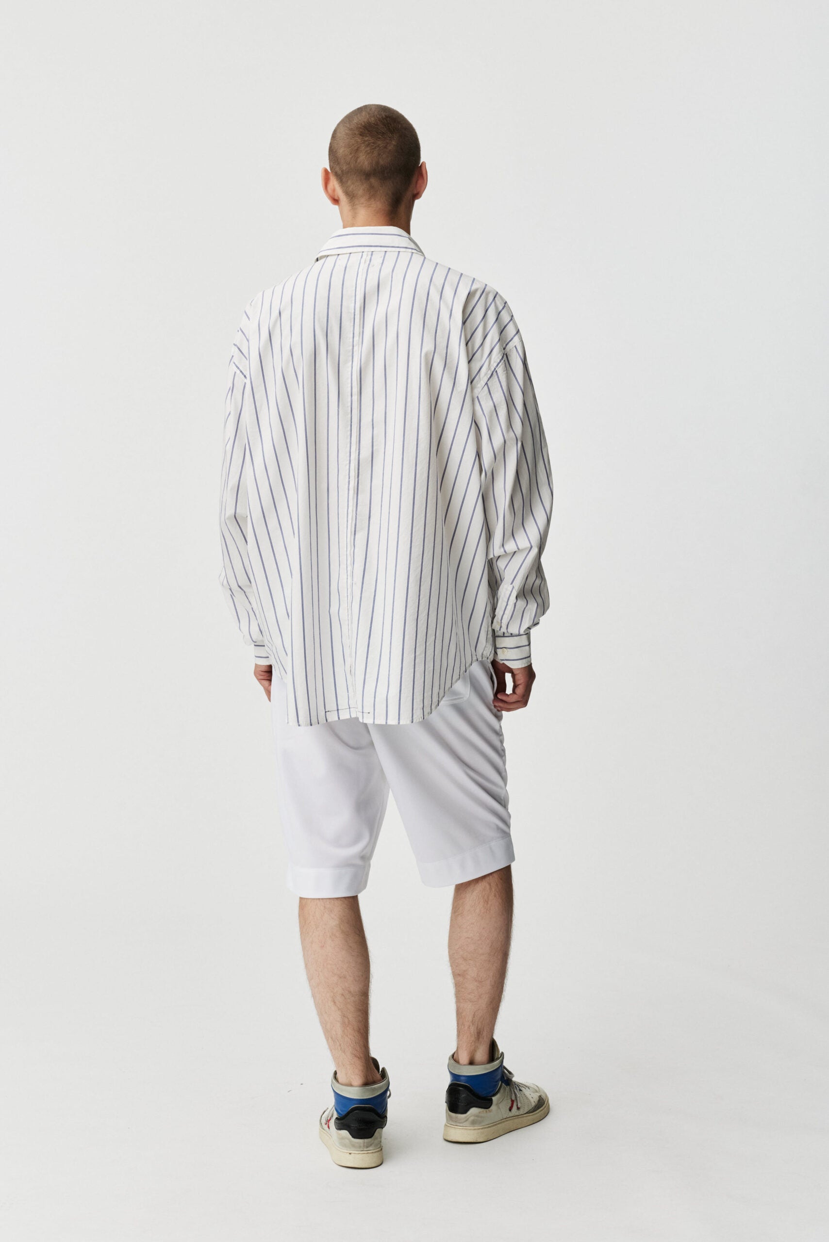 Mo button down shirt in blue stripe by ADNYM from Blackbird Collection's sustainable men's fashion tops