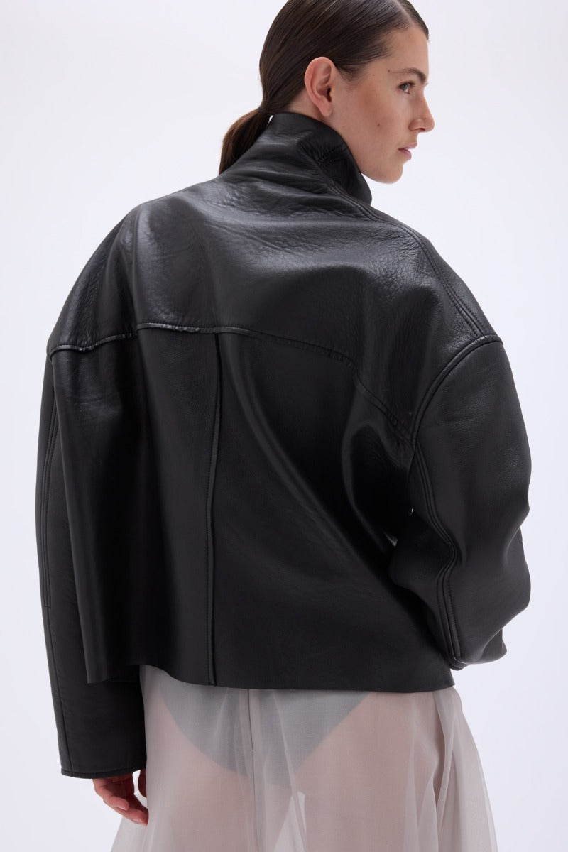 Black Bonded Leather Jacket by REMAIN