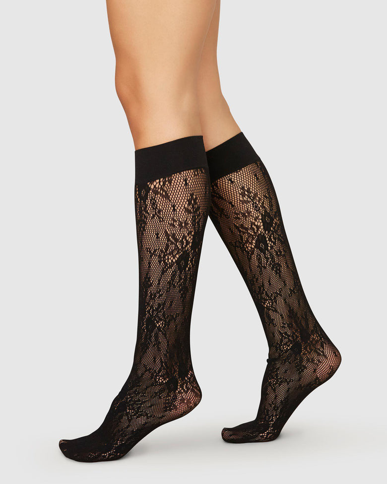 Rosa lace knee-high socks in black by Swedish Stockings from Blackbird Collection's sustainable accessories