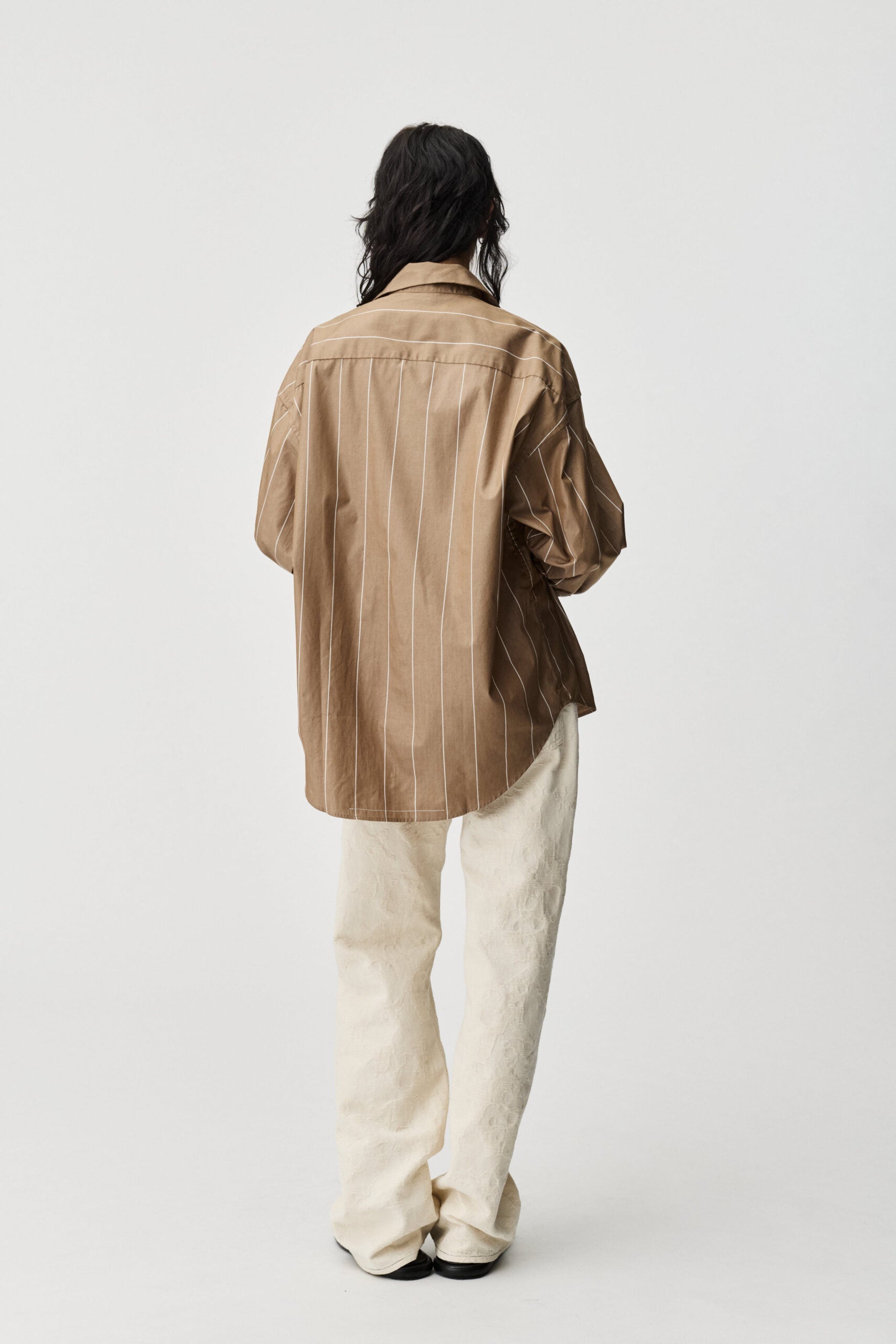 Oat stripe Taq shirt by ADNYM brown striped button down from Blackbird Collection's sustainable men’s fashion