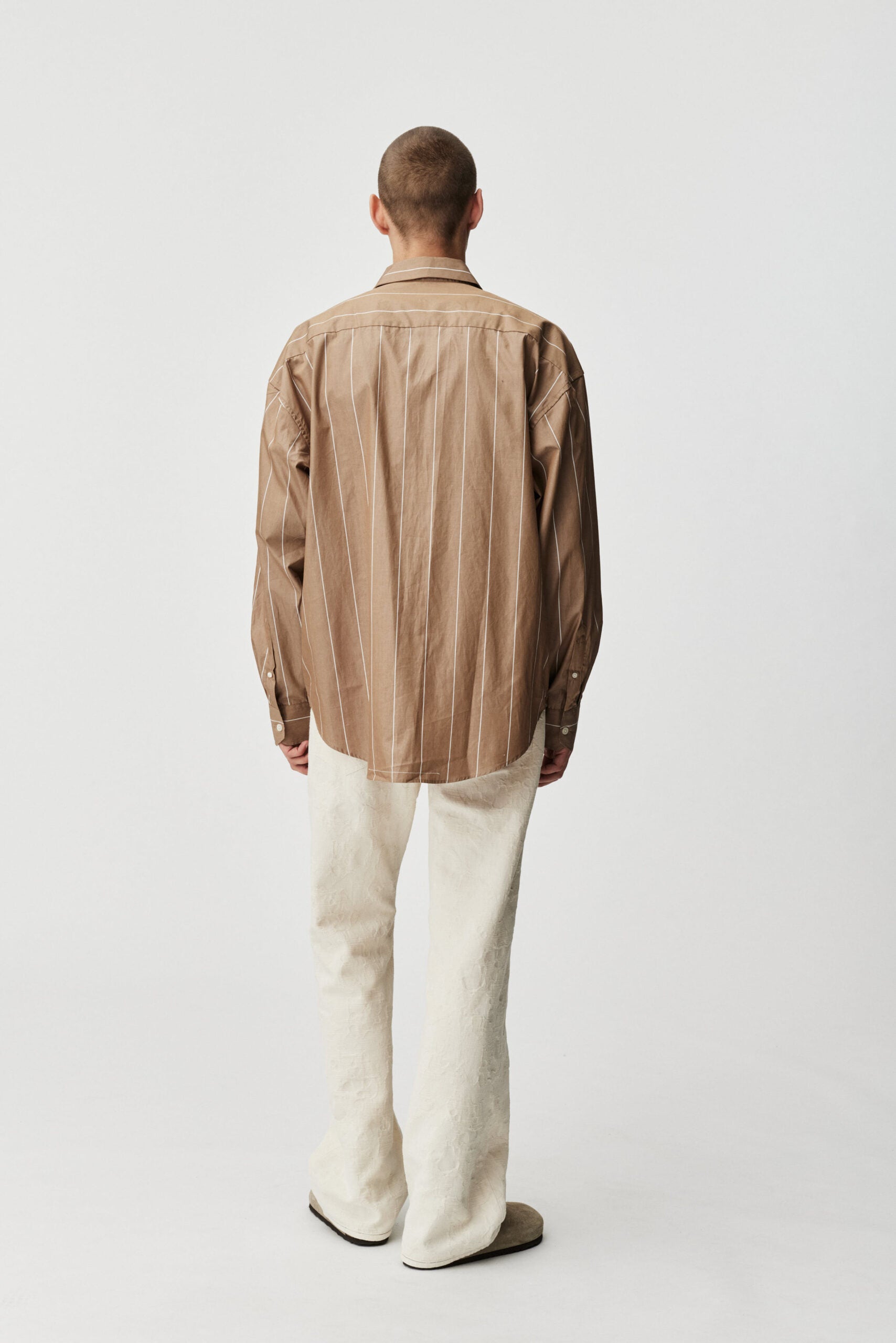 Oat stripe Taq shirt by ADNYM brown striped button down from Blackbird Collection's sustainable men’s fashion