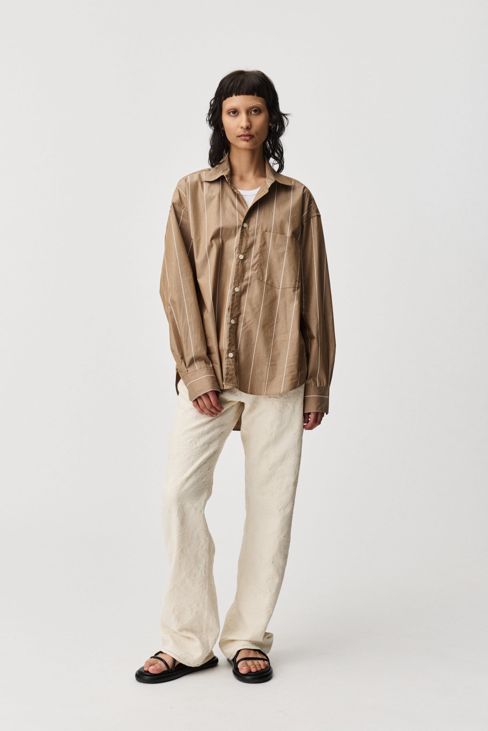 Oat stripe Taq shirt by ADNYM brown striped button down from Blackbird Collection's sustainable men’s fashion