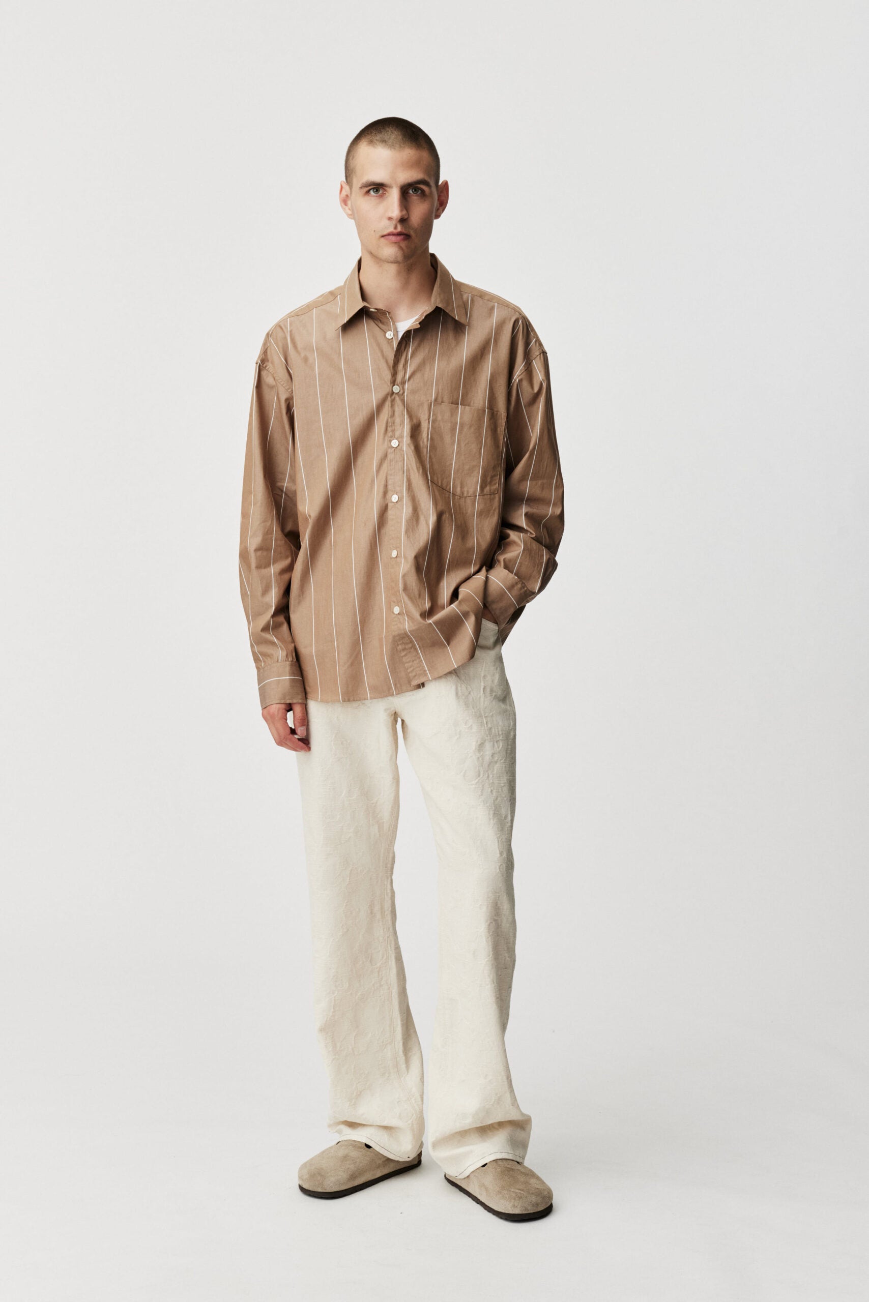Oat stripe Taq shirt by ADNYM brown striped button down from Blackbird Collection's sustainable men’s fashion