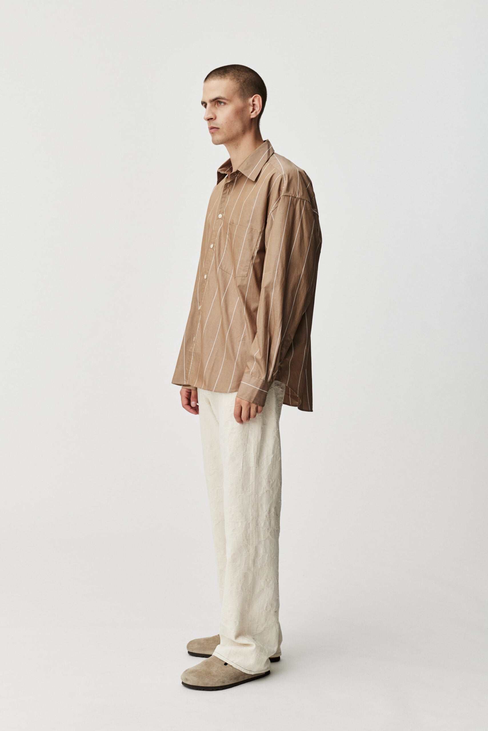 Oat stripe Taq shirt by ADNYM brown striped button down from Blackbird Collection's sustainable men’s fashion