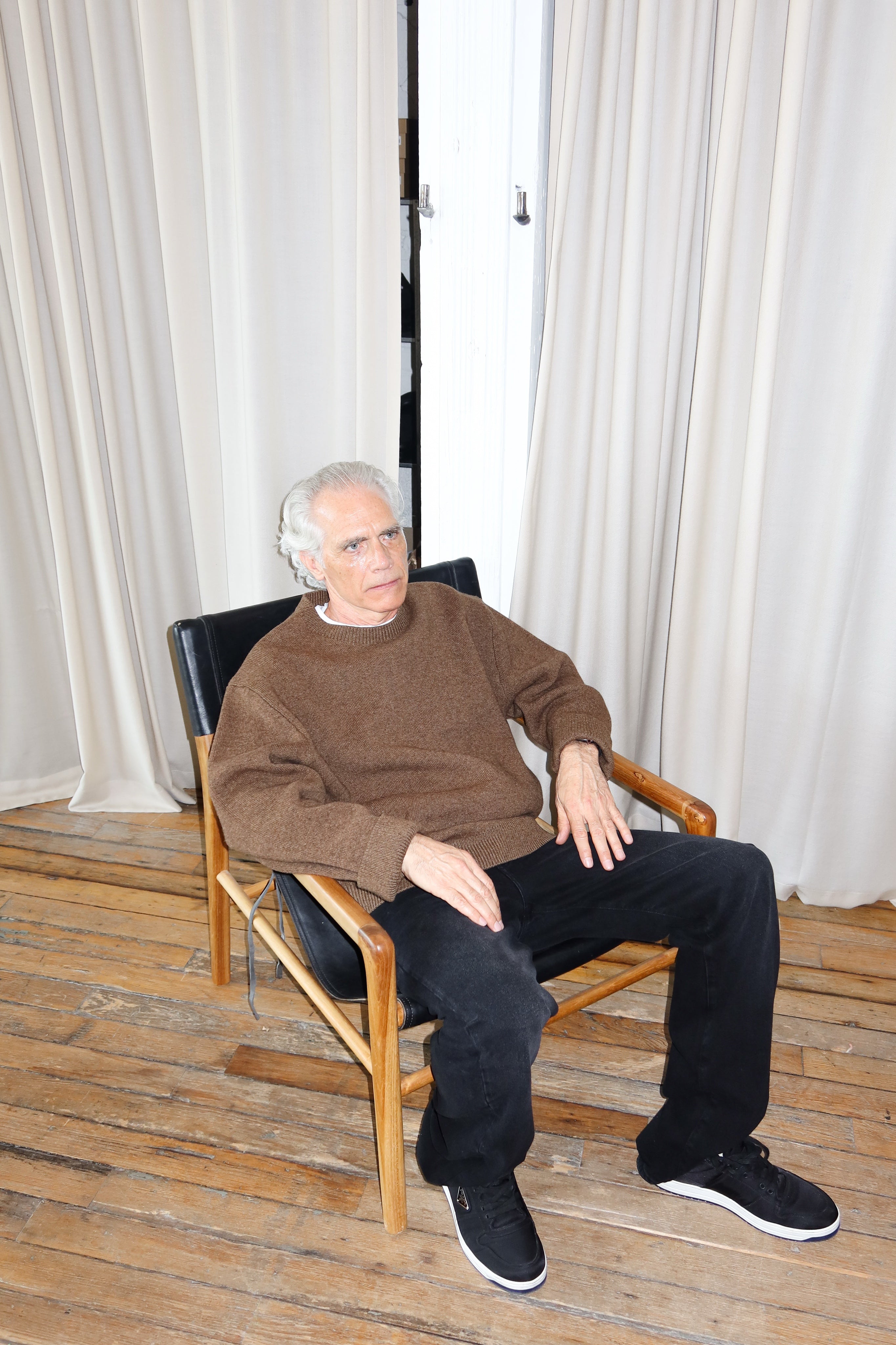 Abo 242 jean for men in distressed black by ADNYM from Blackbird Collection's sustainable fashion