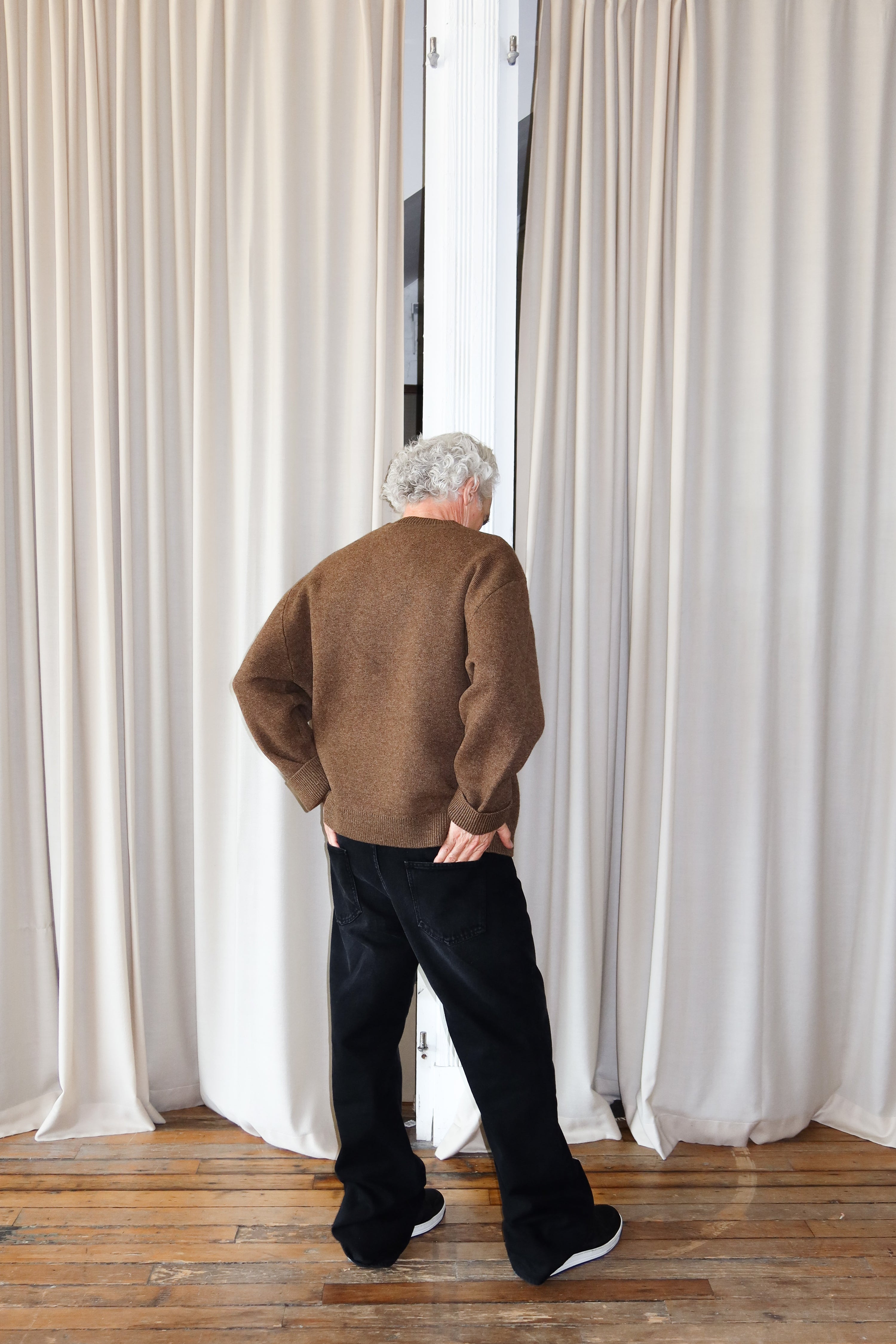 Abo 242 jean for men in distressed black by ADNYM from Blackbird Collection's sustainable fashion