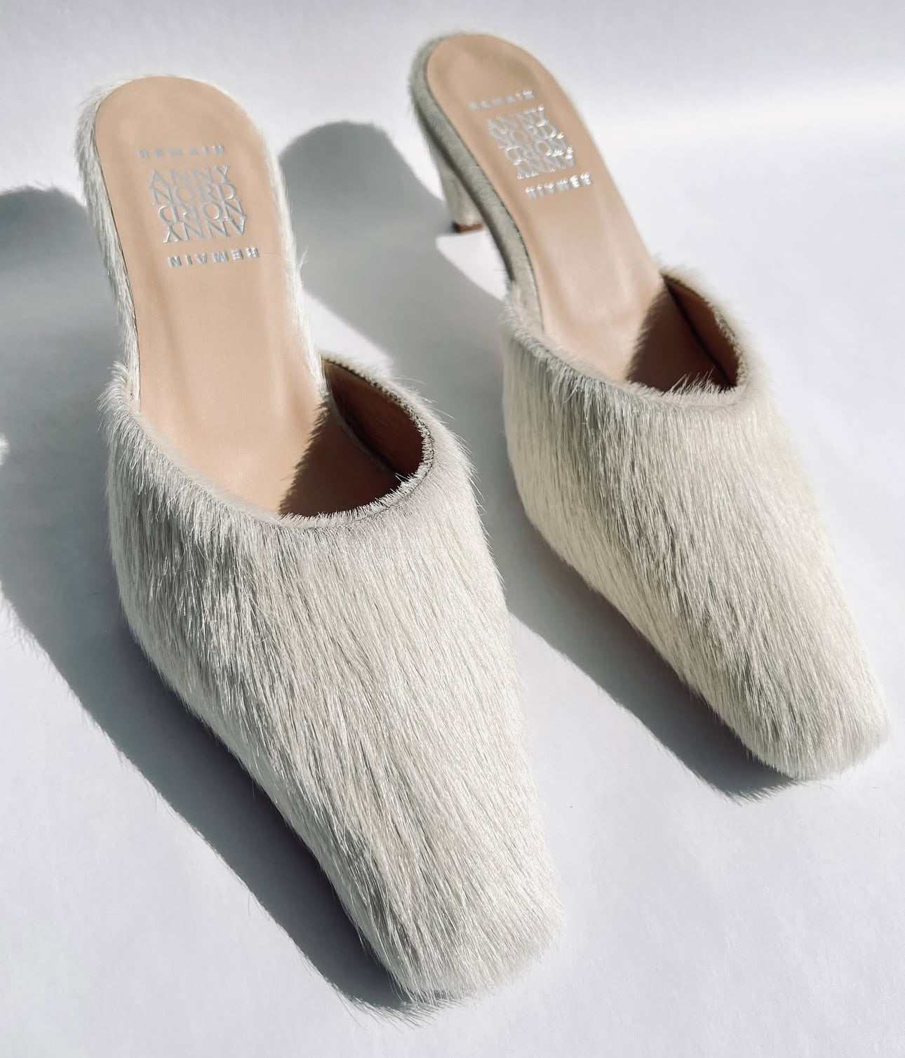 Off-white Bam Bam mules by Anny Nord from Blackbird Collection's sustainable shoes