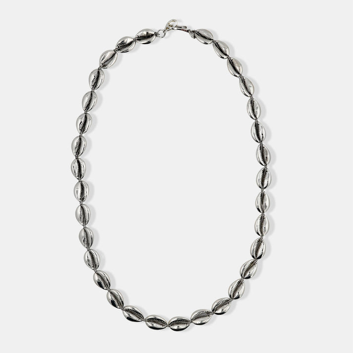 Long silver concha puka necklace by Tohum from Blackbird Collection's sustainable accessories and jewelry