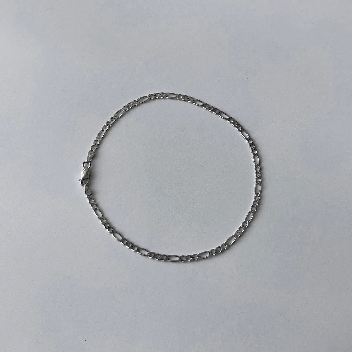 Silver figaro anklet by Enti Ana from Blackbird Collection's sustainable accessories and jewelry