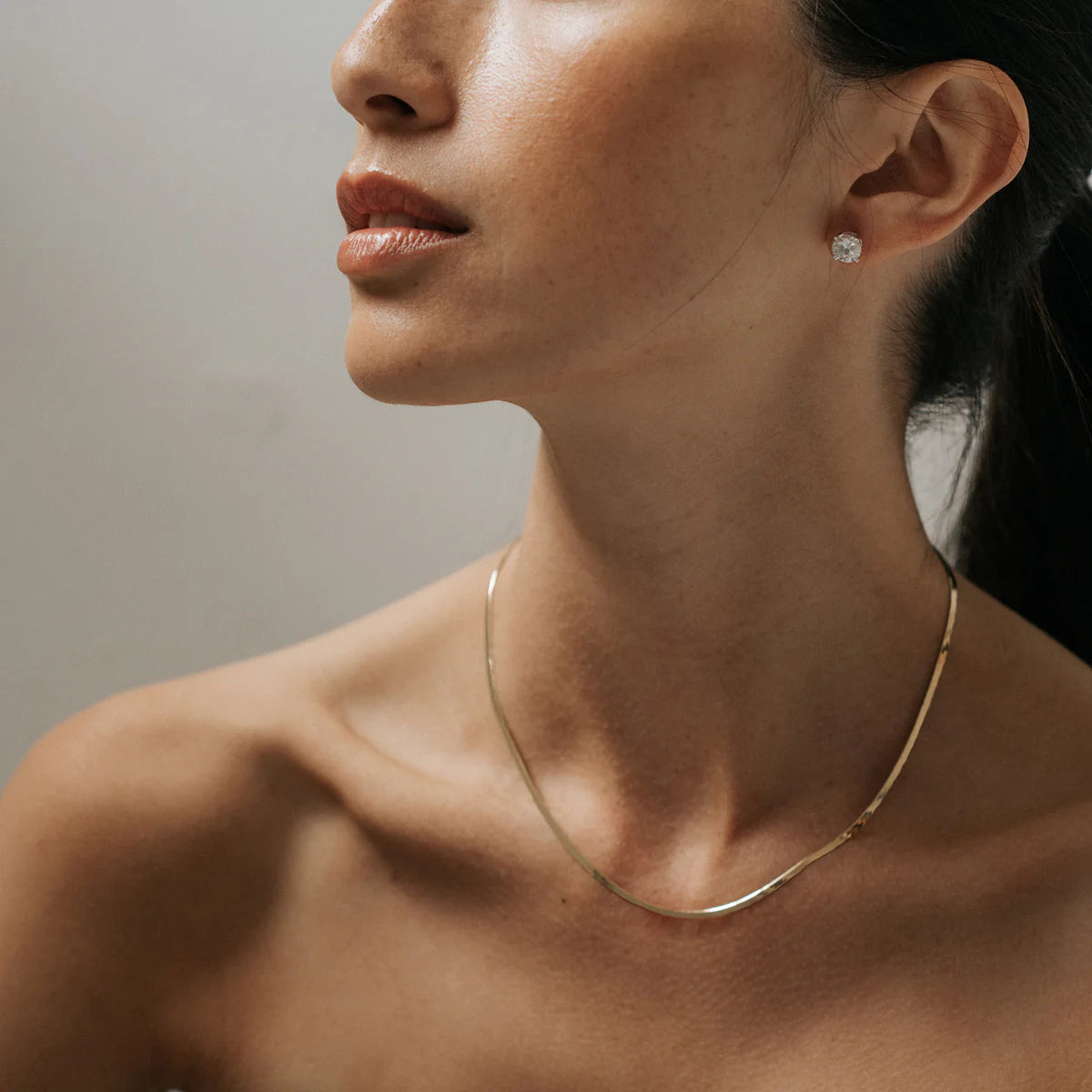 Thin herringbone necklace in gold by Enti Ana from Blackbird Collection's sustainable accessories and jewelry, minimalist layering necklace