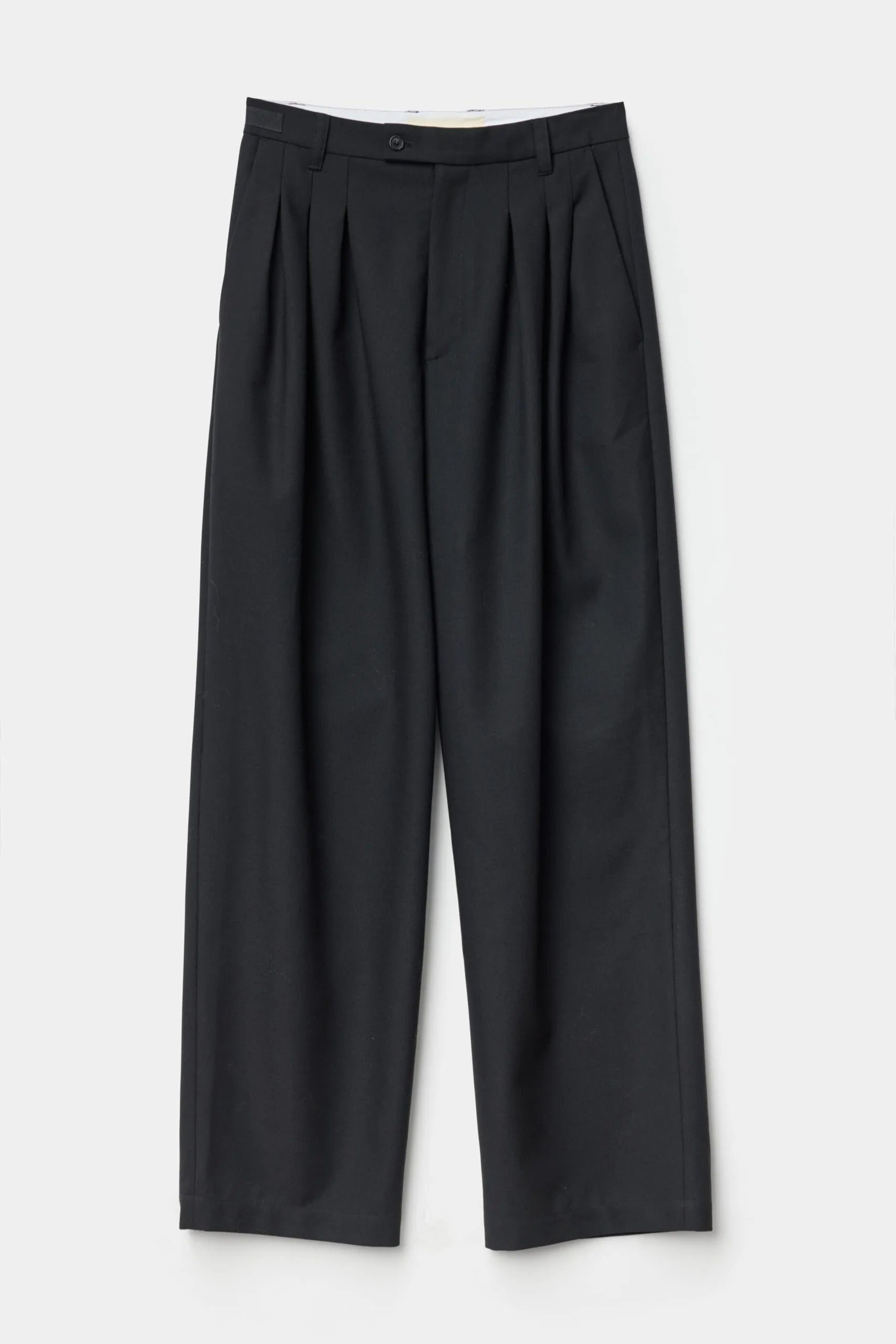 Tuck trouser triple pleated wide trouser with taper in black by ADNYM from Blackbird Collection's sustainable men’s fashion