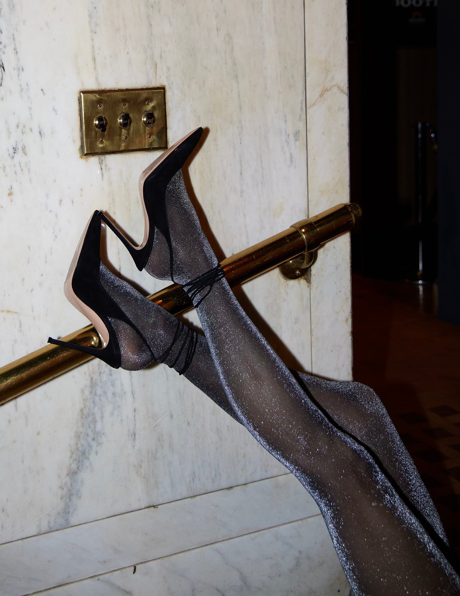 Tora shimmery sheer tights in black by Swedish Stockings from Blackbird Collection's sustainable accessories