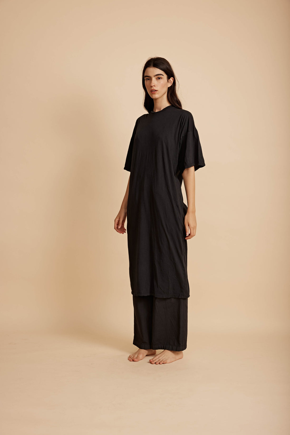 Black Torri oversized midi dress made of 100% cotton by All Three from Blackbird Collection's sustainable dresses and loungewear front