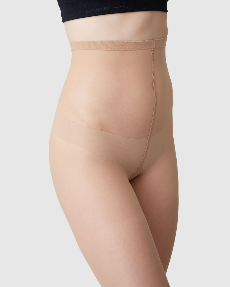 Beige sculpting tights by Swedish Stockings from Blackbird Collection's sustainable accessories
