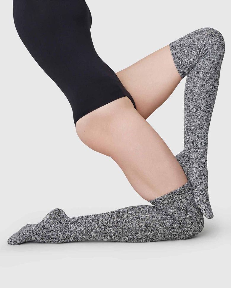 Black and grey over-knee socks by Swedish Stockings from Blackbird Collection's sustainable accessories